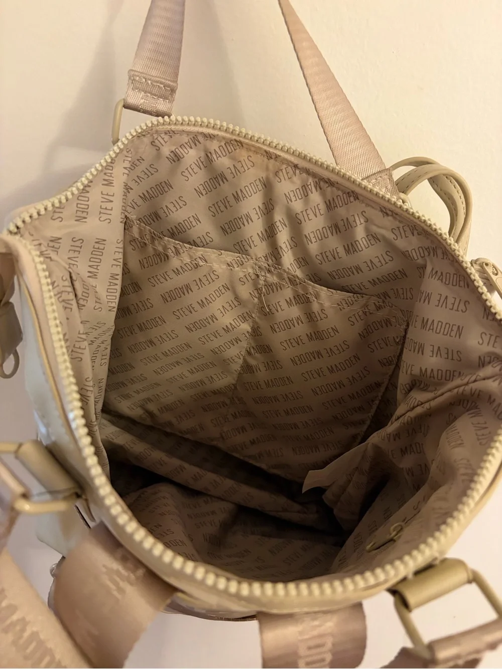 Steve Madden backpack featuring a smaller matching pouch attached